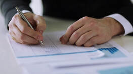 Image of attorney signing law firm financing agreement from Advanced Legal Capital