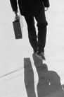 Image of attorney walking to court - small law firms can obtain case portfolio financing from $25K to $250K from Advanced Legal Capital